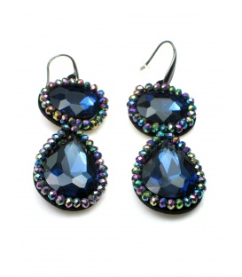 Mooie blauwe oorbellen met irriserende kralen rand