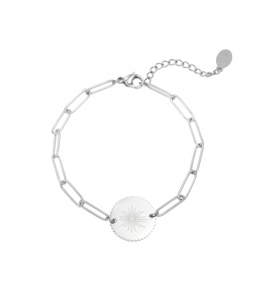 Zilverkleurige schakelarmband met een ronde bedel en een oog als afbeelding