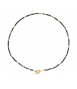 Zwarte met goudkleurige halsketting met kralen, er is ook bijpassende armband bij.