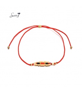Rode elastische armband met goudkleurig detail met kleine kraaltjes