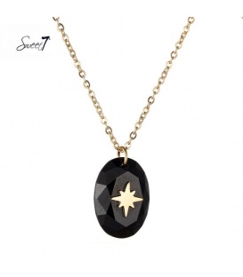 Goudkleurige ketting met zwarte steen met een ster