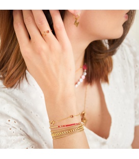 Goudkleurige armband met donkergroene geboortesteen mei