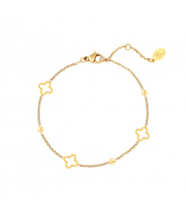 Goudkleurige armband met kleine open klavertjes