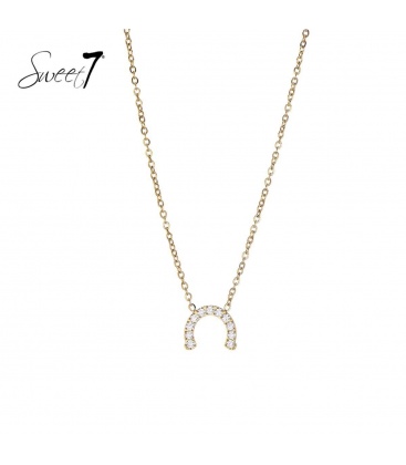 Goudkleurige halsketting met hoefijzer van zirkoonsteentjes