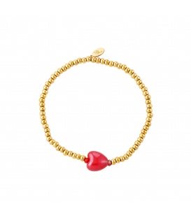 Goudkleurige kralen armband met rode hart kraal