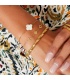 Zilverkleurige armband met drie verschillende bloemetjes