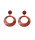 Rood gekleurde oorclips met een effen oorstukje