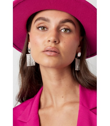 Zilverkleurige oorhangers met hangende slingers en strass steentjes