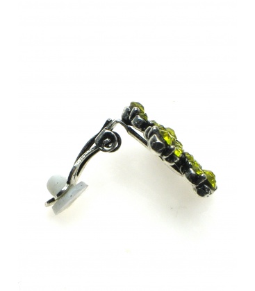 Oorclips met gele strassteentjes in bloemvorm