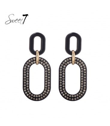 Zwarte oorhangers met een goudkleurig element en strass steentjes