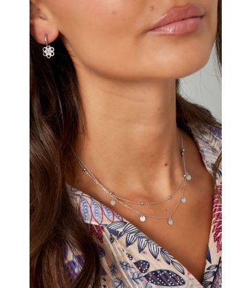 Zilverkleurige dubbele halsketting met hangende cirkels en bolletjes