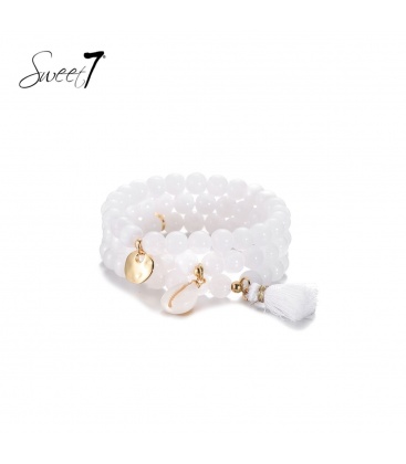 Witte kralen armband met meerdere strengen