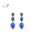 Oorbellen met blauwe glas steentjes