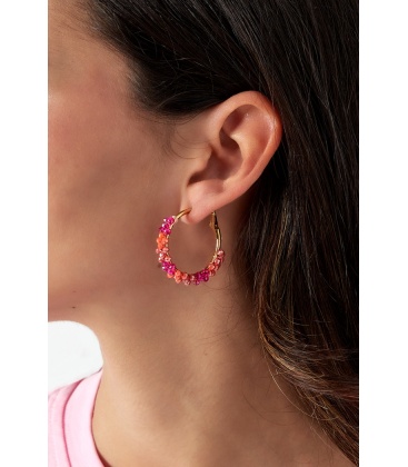 Goudkleurige oorringen met blauwe glass steentjes