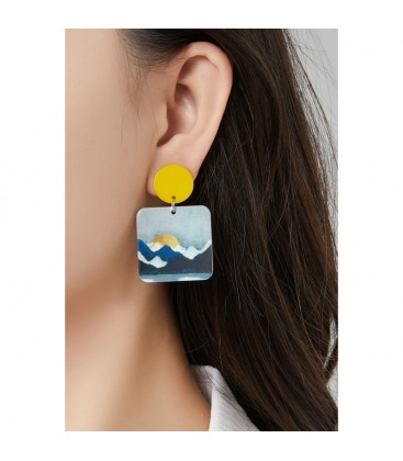 Oorclips blauw met een bedrukte bladeren print