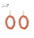 Oranje oorhangers met glas steentjes