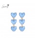 Blauwe oorhangers met 3 harten onder elkaar.