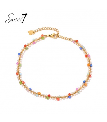 Goudkleurig enkelbandje met gekleurde kralen