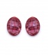 Roze gekleurde ovale oorclips van resin