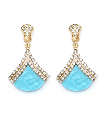 Goudkleurige oorclips met een blauw vlak en heldere strass steentjes