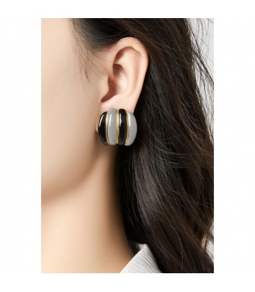 Oorclips in 2 kleuren blauw met goudkleurige strepen