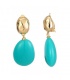 Turquoise oorclips met een goudkleurig oor stukje