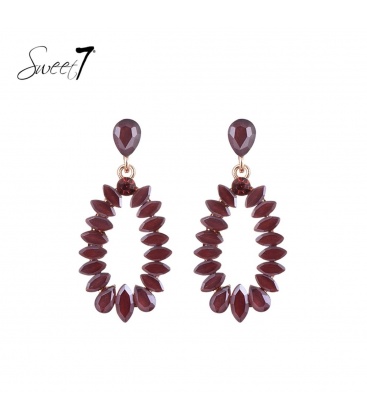 Bruine ovale oorhangers gevuld met glas steentjes