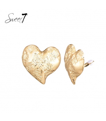 Goudkleurige grote oorclips met sculpturaal hart 