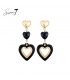 Zwarte oorhangers met 3 harten en een goudkleurig detail