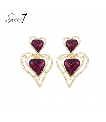 Oorhangers met rode harten en goudkleurige omlijsting
