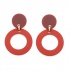 Rode oorclips met ronde open vorm in trendy tinten