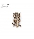 Goudkleurige uil broche gevuld met beige glas steentjes