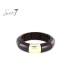 Armband bruin met een breed design en goudkleurig accent