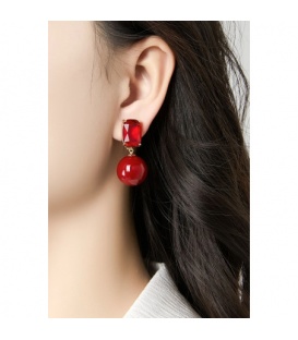 Oorclips groen met een glas steentje en een glanzende bol