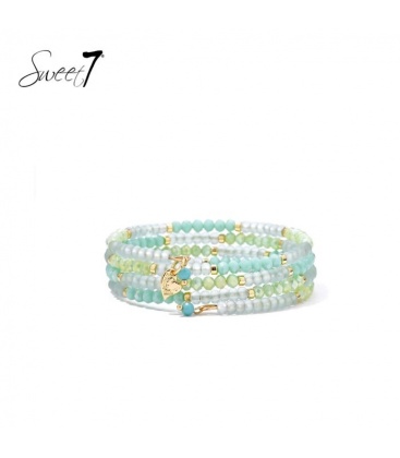 Armband groen met kralen in mint en goudtinten