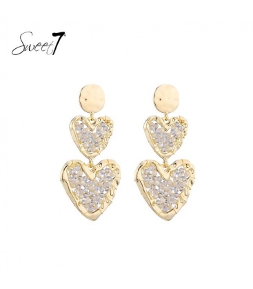 Oorbellen met dubbele harten en beige steentjes