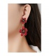 Oorclips rood met dubbele bloemvorm en goudkleurige rand