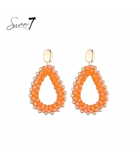 Oorbellen met oranje kralen en een goudkleurige rand