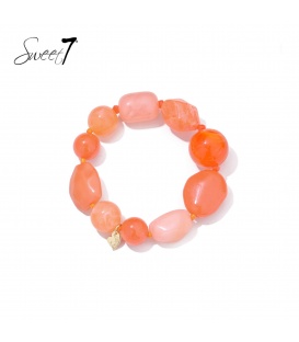 Armband met perzik en oranje kralen