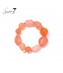 Armband met perzik en oranje kralen
