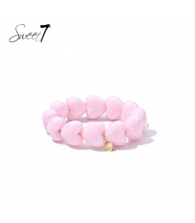 Armband met roze hartvormige kralen 