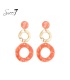 Oorbellen met oranje ronde hanger en goudkleurige schakel