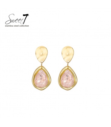 Oorbellen met moderne beige hanger en goudkleurige rand