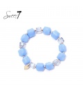 Armband met zachtblauwe en transparante kralen