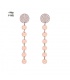 Oorbellen rose goudkleurig met strass bezette ronde top en hangende schijfjes