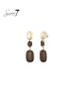 Oorclips bruine met goudkleurige knop en strass steentje