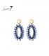 Oorbellen blauw met glas kralen en goudkleurige top